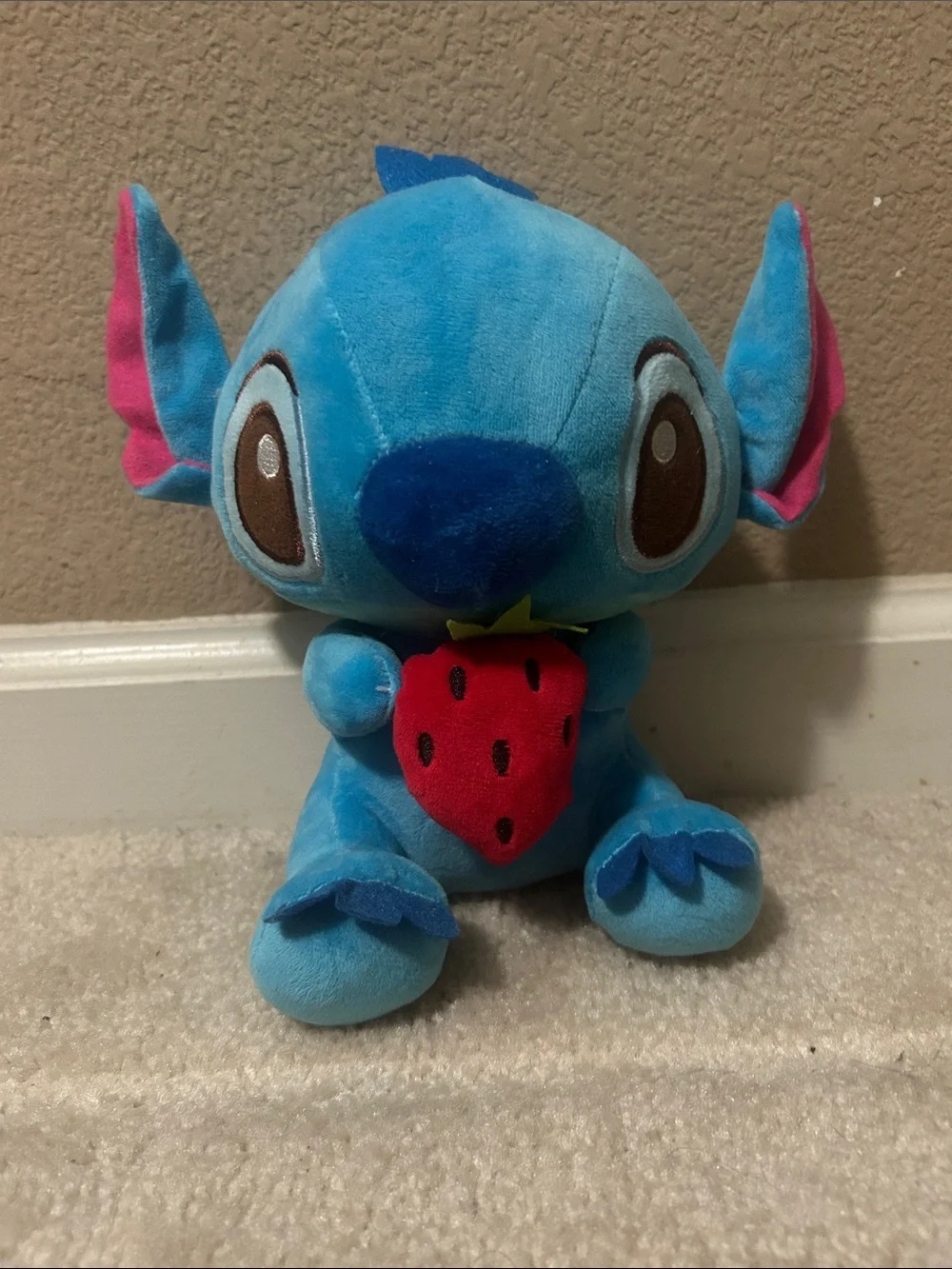 Plushie Toy Of Disney’s Stitch Holding A Red Strawberry- Lilo & Stitch